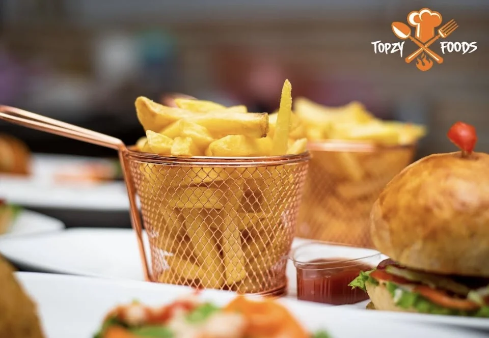 Fries served alongside a burger