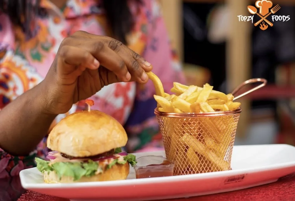 Burger and fries at the table