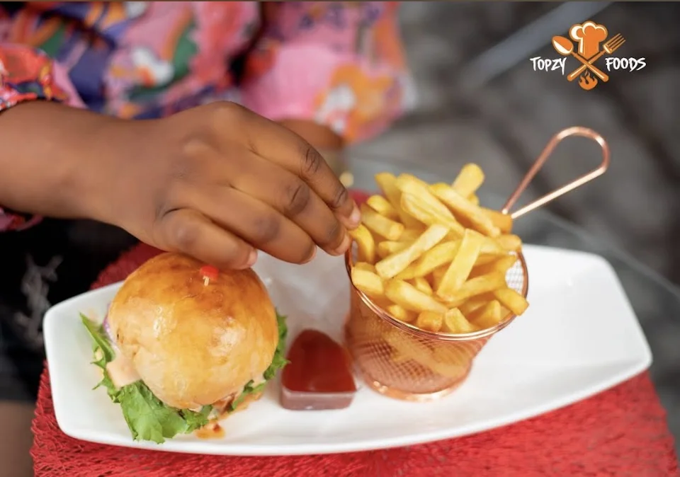 Burger and fries on a white plate