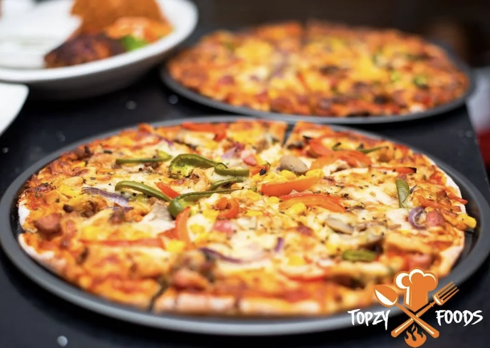 Pizza photographed at Topzy Foods
